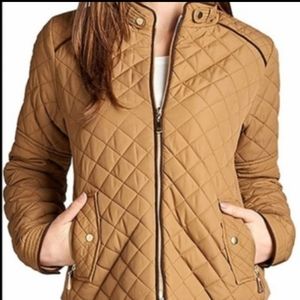 Tan padded jacket with brown pipping